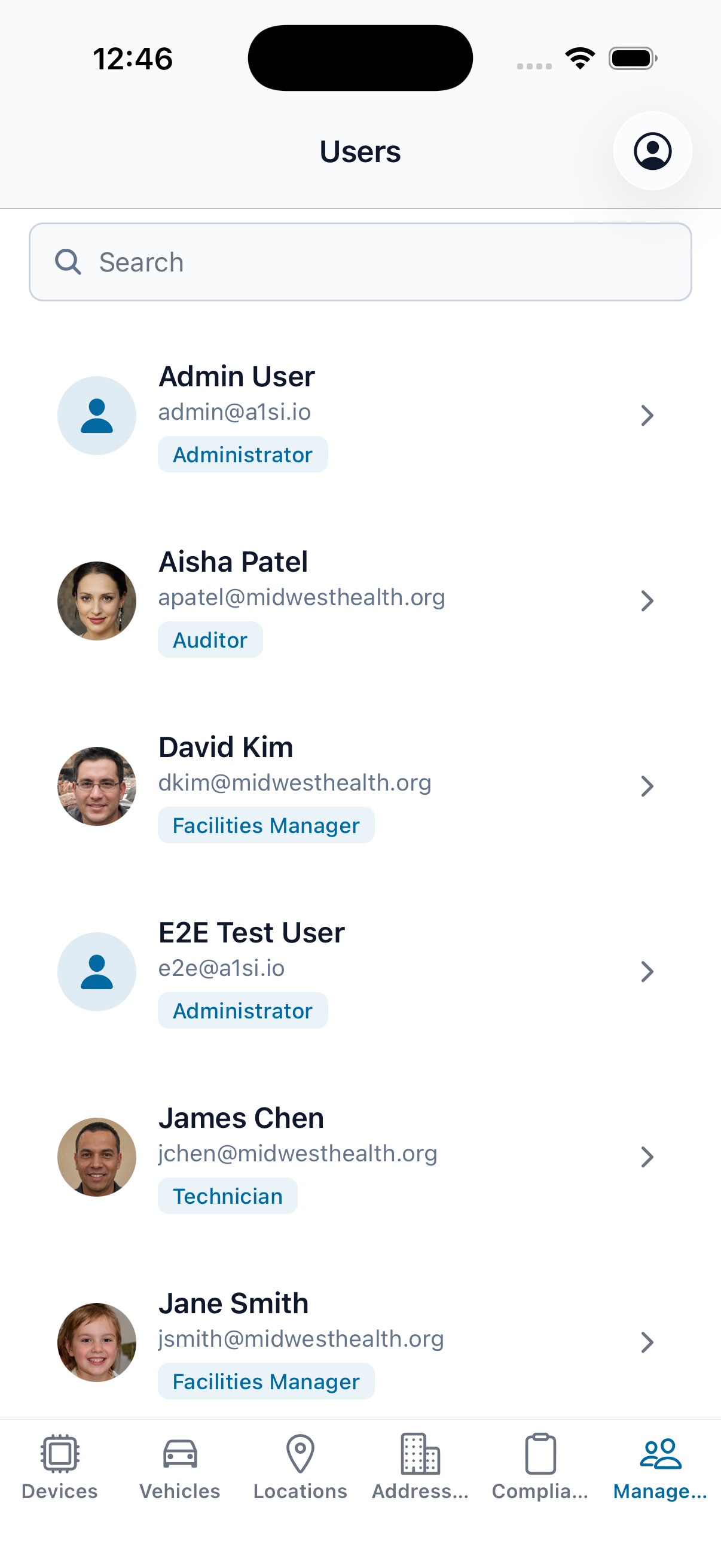 The EMDT iPhone app management view for users: the team roster with role assignments, reachable from the bottom Management tab.