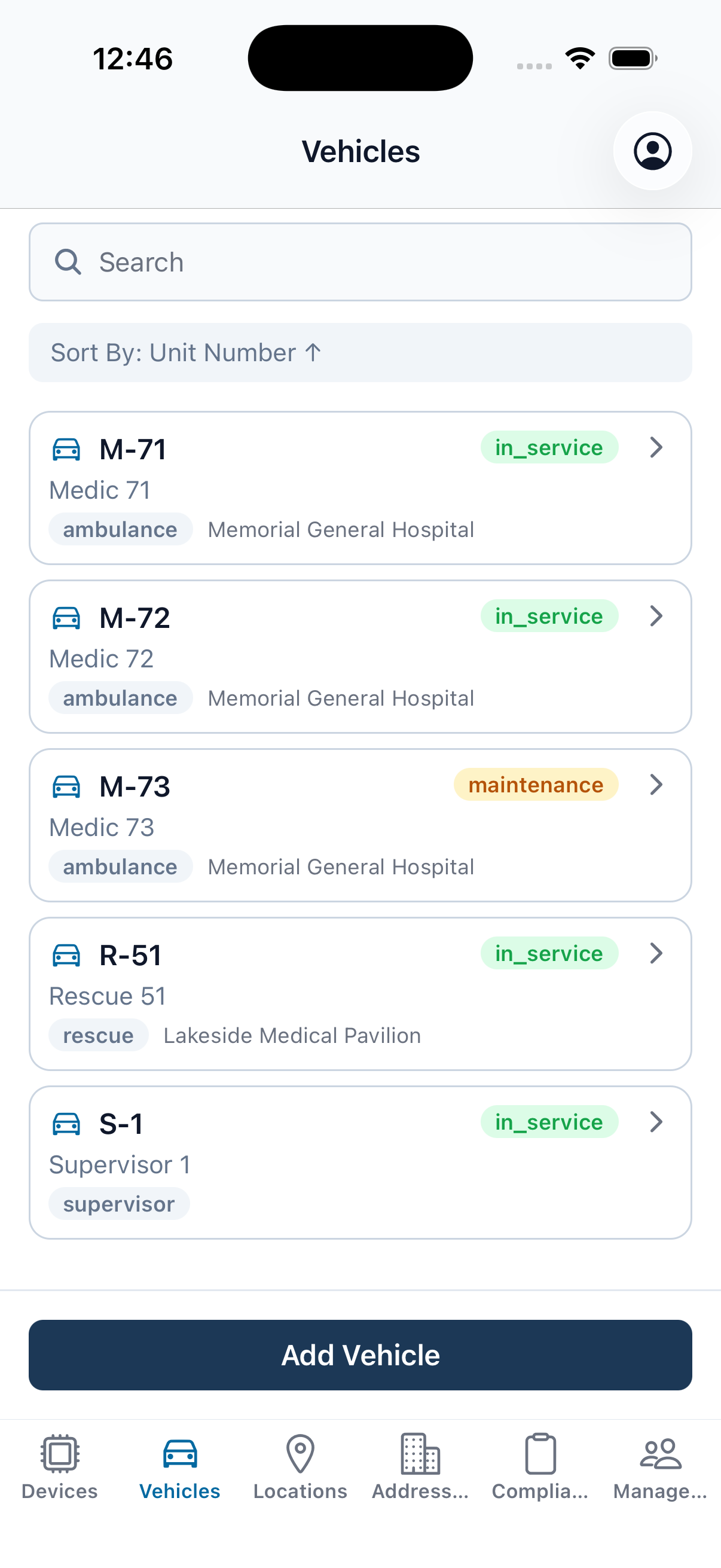 The EMDT iPhone app Vehicles tab: a list of response units — ambulances Medic 71–73, Rescue 51, and a supervisor unit — each with its unit number, type, in-service or maintenance status, and home facility.